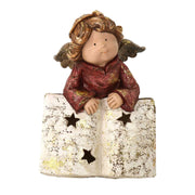 Ange en résine avec livre doré cm17x15,5h22,5