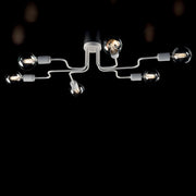 Plafonnier à six lumières en fer blanc argenté diamètre 83x h17 cm
