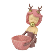 Femme en résine rose cm21x15,8h29,3