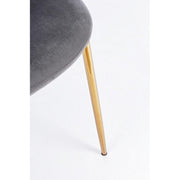 Chaise de salon en velours gris avec des jambes dorées