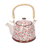 Théière ronde en céramique blanche avec fleurs rouges cmø15h14