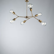 Lustre en fer bronzé brossé six lumières 71x h64 cm