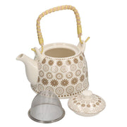 Théière en céramique blanche avec décorations crème cmø15h16