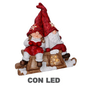 Résine LED Père Noël avec enfant rouge cm40x26h15