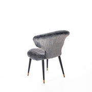Fauteuil en fausse fourrure grise et pieds noir/or