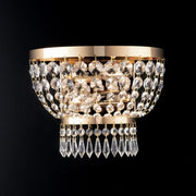 Applique impériale en fer et laiton doré à deux lumières 27x h22 cm