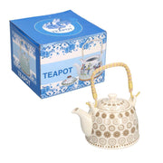 Théière en céramique blanche avec décorations crème cmø15h16