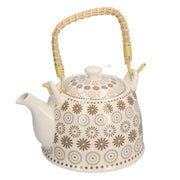 Théière en céramique blanche avec décorations crème cmø15h16